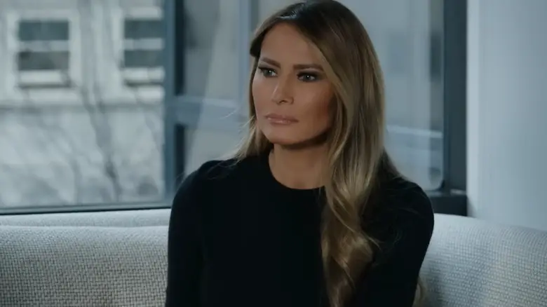 Melania Trump sitting on a couch in Melania