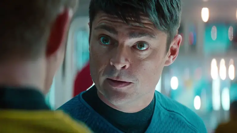 Karl Urban as Bones giving a serious look to Chris Pine as Kirk in Star Trek: Into Darkness