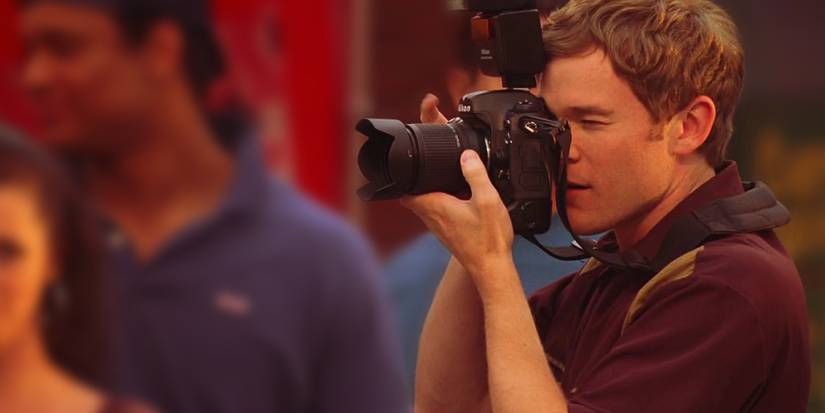 Jimmy Olsen taking a picture in Smallville