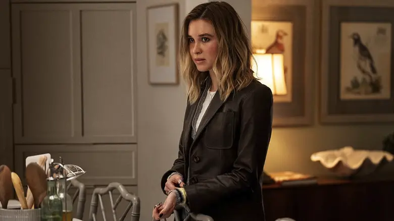 Isabel May as Tatum standing in a kitchen in Scream 7