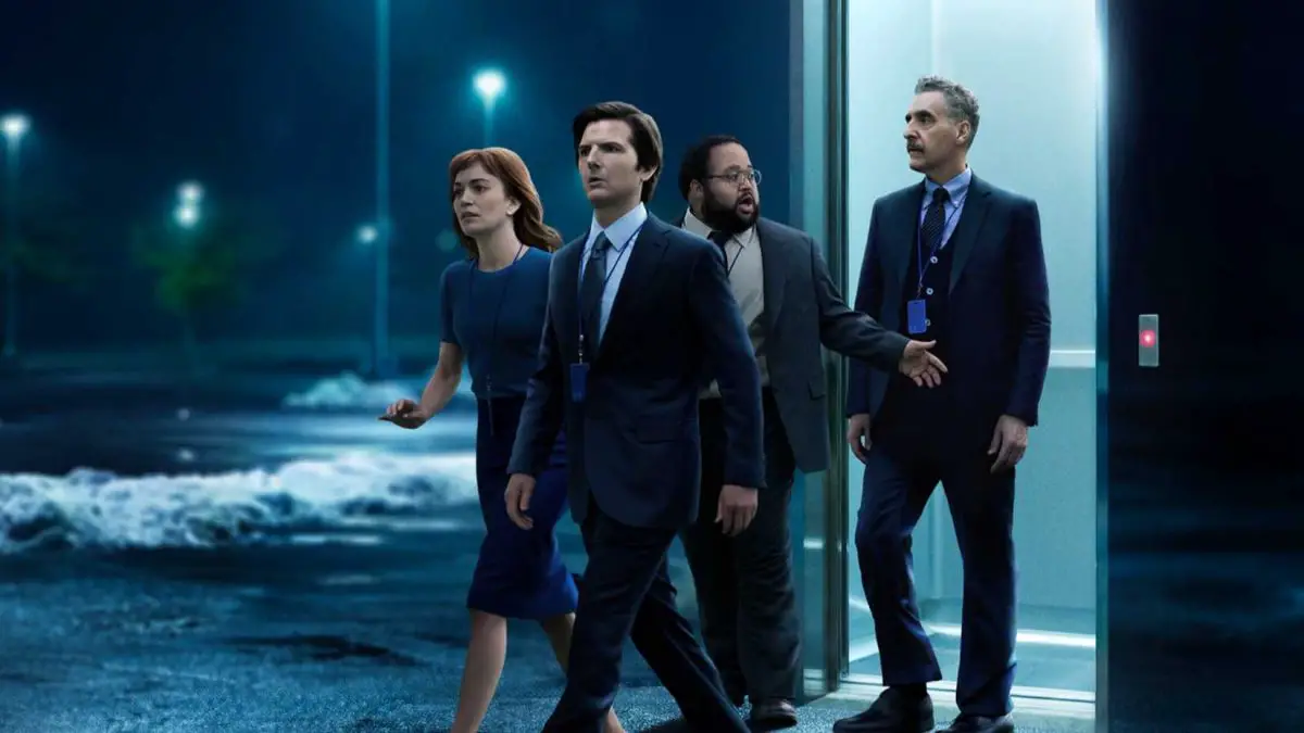 The cast of AppleTV's Severance walking out of an elevator and into a parking lot.