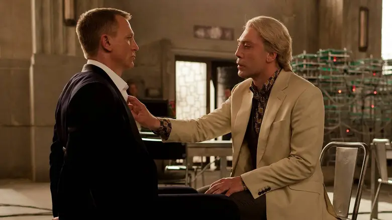 Javier Bardem as Silva touching the chest of Daniel Craig as James Bond during their first meeting in Skyfall