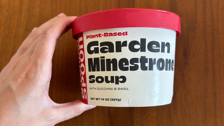 Splendid Spoon Garden Minestrone Soup packaging on wood table.