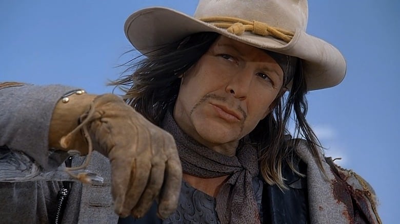 Graff leaning on a post in "The Last Outlaw"