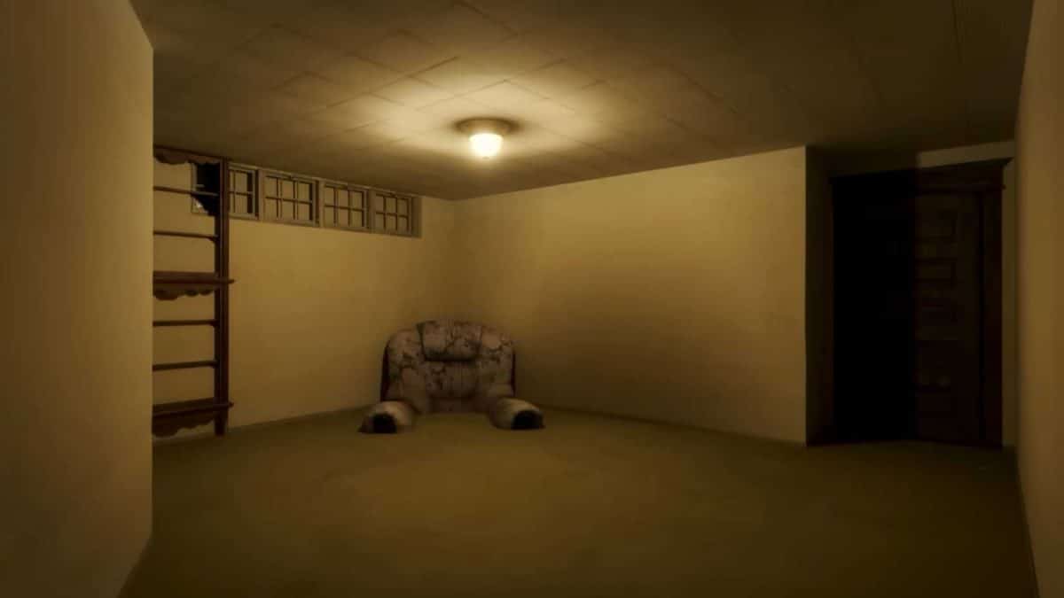 A sofa sinking into the floor in Backrooms