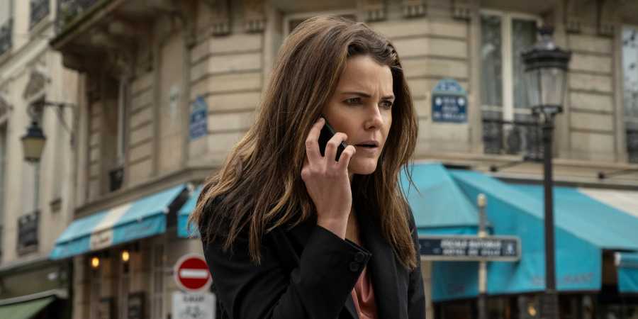 Kate Wyler (Ker Russell) on the phone in The Diplomat.