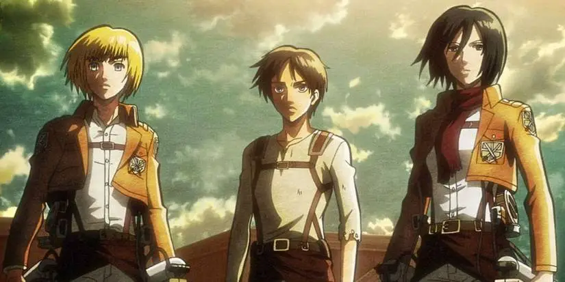Armin Arlet, Eren Yaeger, and Mikasa Ackerman look over Wall Maria in Attack on Titan.