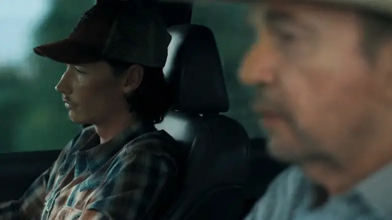 Jacob Lofland's Cooper Norris sits alongside Billy Bob Thornton's Tommy Norris in a car in Landman