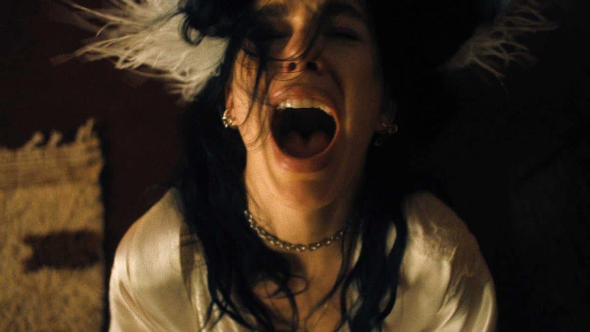 Rachel Harkin screams while looking upward in episode 6 of Something Very Bad Is Going To Happen