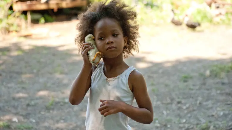 Hushpuppy holding a baby chick in Beasts of the Southern Wild