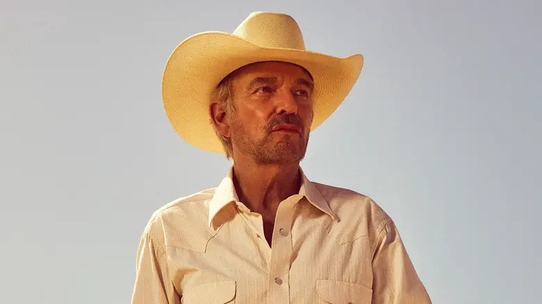Billy Bob Thornton's Tommy Norris is seen against a clear sky in Landman