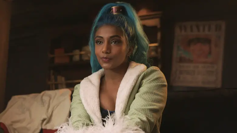 Miss Wednesday looks smug while talking to someone offscreen in One Piece