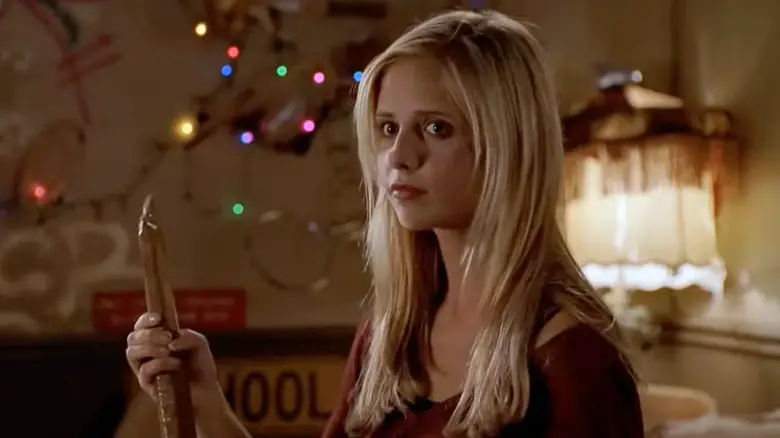 Buffy Summers (Sarah Michelle Gellar) holding a stake in Buffy the Vampire Slayer