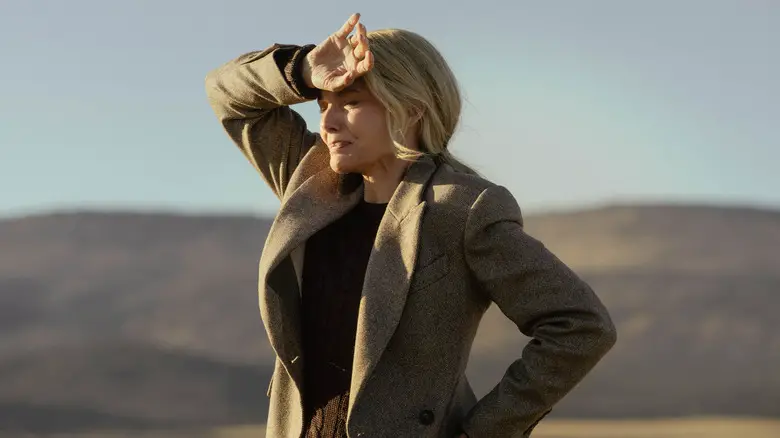Stacy (Michelle Pfeiffer) looking into the distance on "The Madison"
