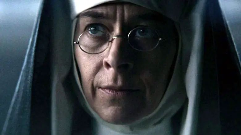 Kate Dickie as Mother Superior wearing a nun habit and glasses in Peaky Blinders