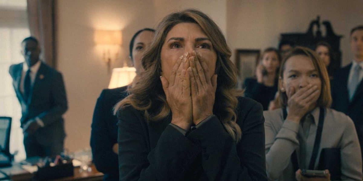 Marsha (Amy Pietz) covering her mouth in Paradise (2025) Season 1 Ep 7