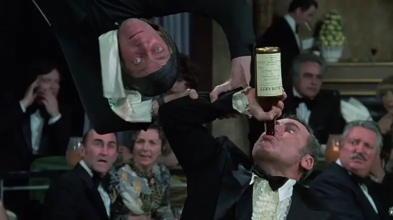 Marty hanging from the ceiling and Mel drinking heartily in Silent Movie