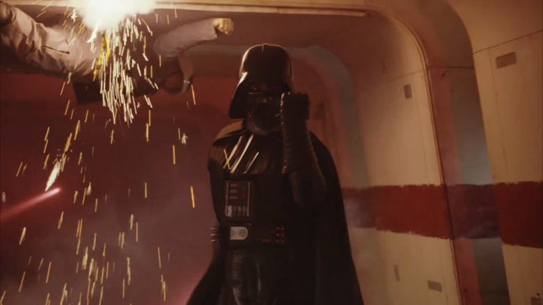 Rogue One: A Star Wars Story - Darth Vader hallway scene, with rebel soldier pinned to ceiling with force