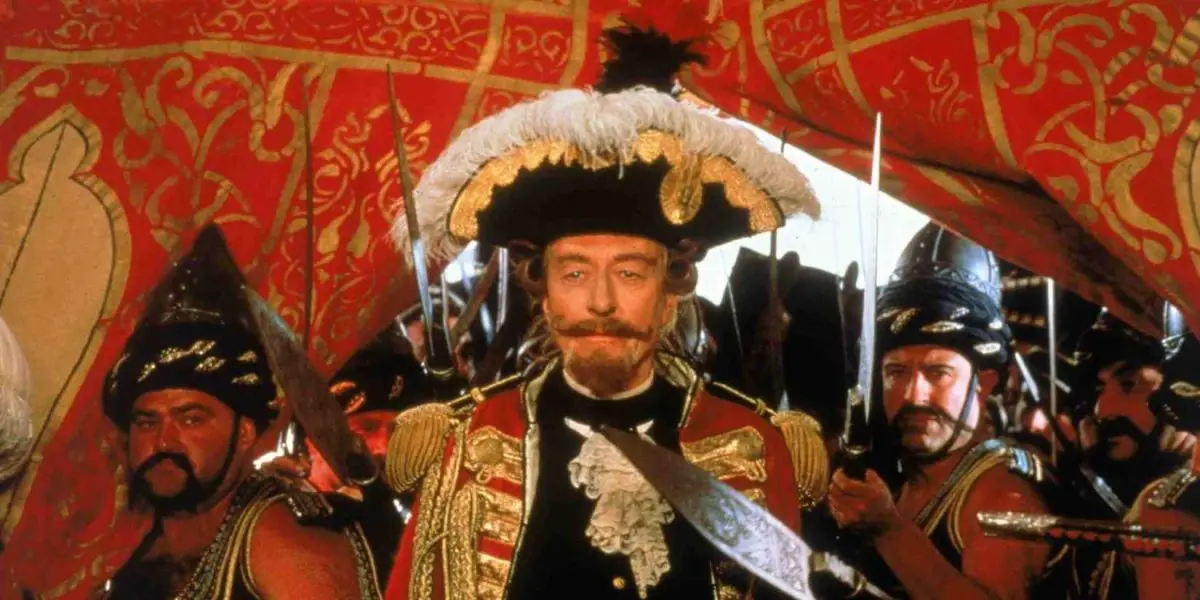 John Neville as Baron Munchausen in historic military uniform in The Adventures of Baron Munchausen.