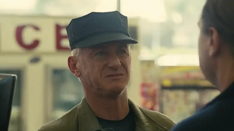 Lockjaw stares at Bob in a grocery store line in One Battle After Another