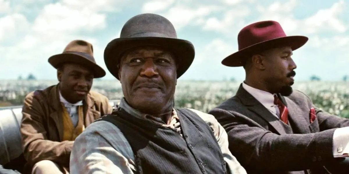 Three characters from Sinners in the car