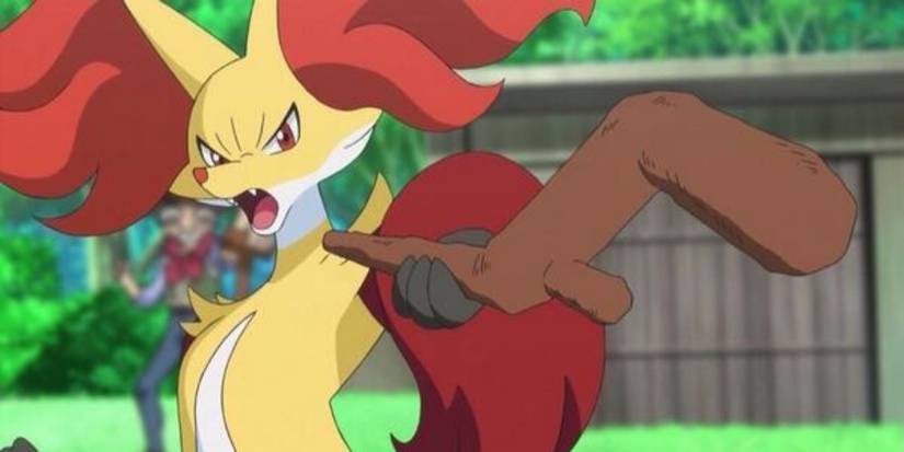 Delphox pointing with a stick while looking angry in the Pokemon anime.