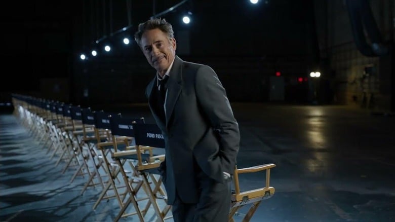 Robert Downey Jr. standing by all of the chairs in the Avengers: Doomsday cast announcement video