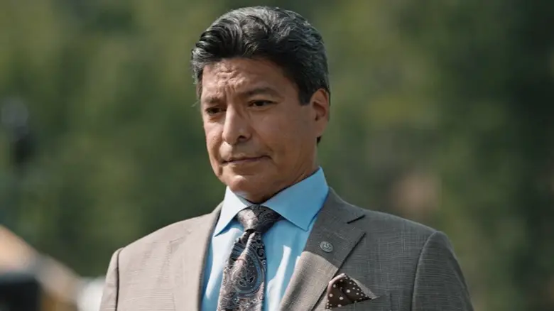 Thomas Rainwater (Gil Birmingham) standing outside on Yellowstone